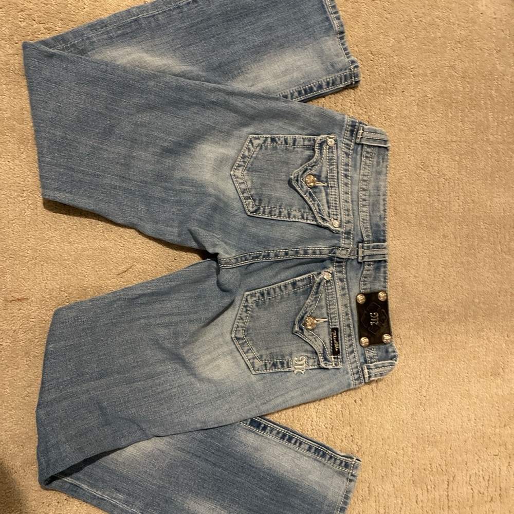 light wash, low rise, boot cut, miss me jeans